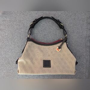 Dooney & Bourke Beige Canvas Satchel with Black Trim and Red Accent